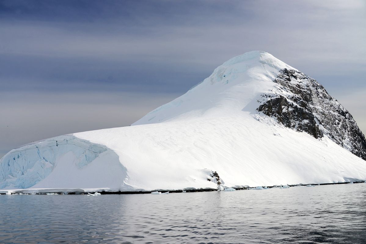 16A Glacier Clad Southern Cuverville Island From Zodiac On Quark Expeditions Antarctica Cruise